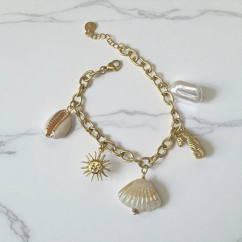 Bracelet doré breloque theme coquillage Rklisa