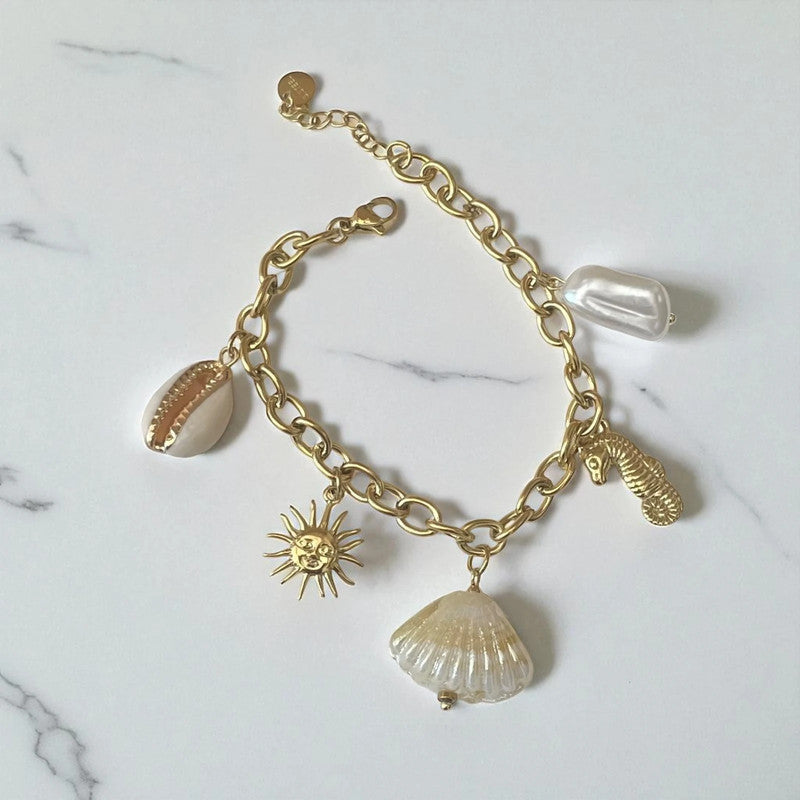 Bracelet doré breloque theme coquillage Rklisa