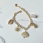 Bracelet doré breloque theme coquillage Rklisa