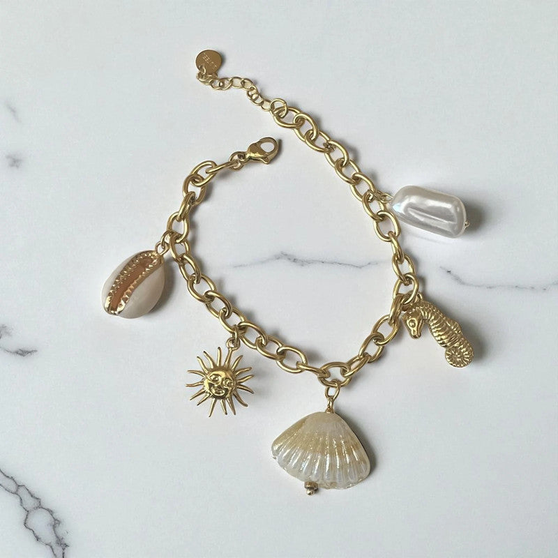 Bracelet doré breloque theme coquillage Rklisa