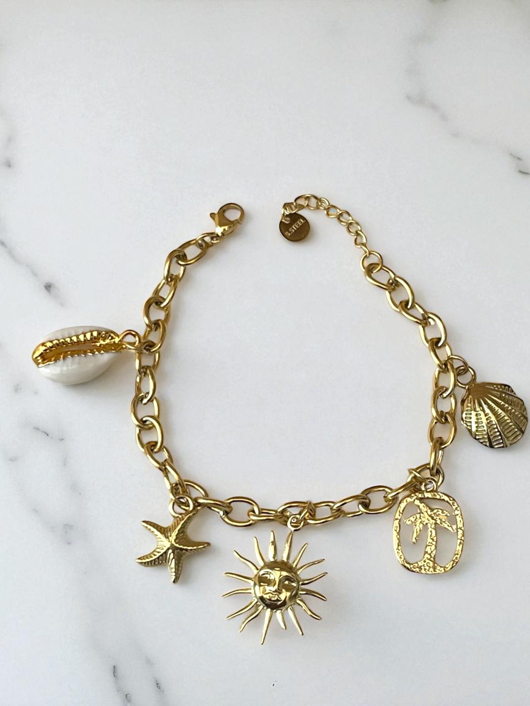 Bracelet doré charms thème mer Rklisa