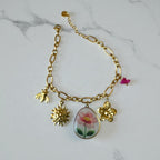 Bracelet chaîne dorée avec charms fleur dessinée Rklisa