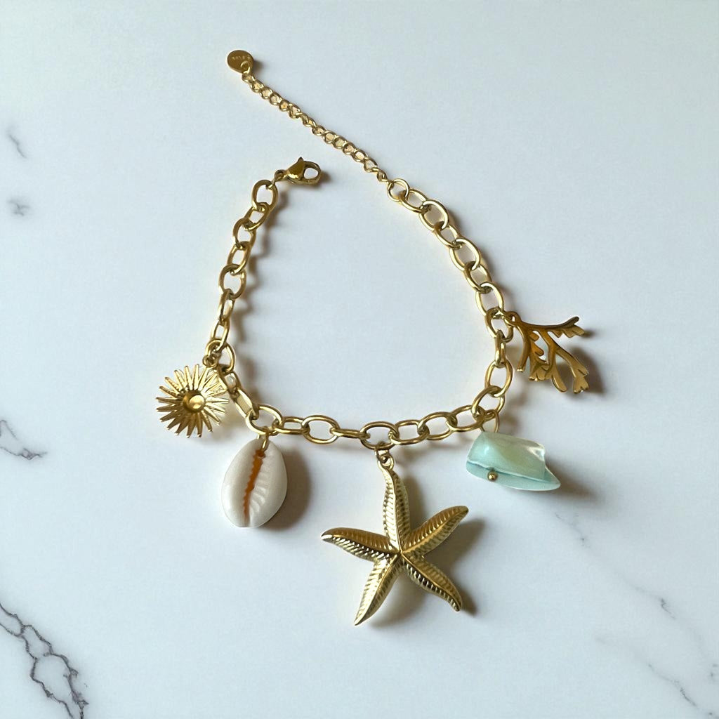 Bracelet doré charms étoile de mer coquillage perle Rklisa