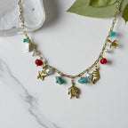 Collier acier inoxydable pendentif marins et perles colorées Rklisa