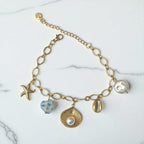 Bracelet chaîne dorée breloques de la mer bleu Rklisa