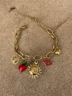 Bracelet chaîne dorée charms soleil pendentifs rouges Rklisa