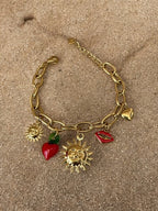 Bracelet chaîne dorée charms soleil pendentifs rouges Rklisa