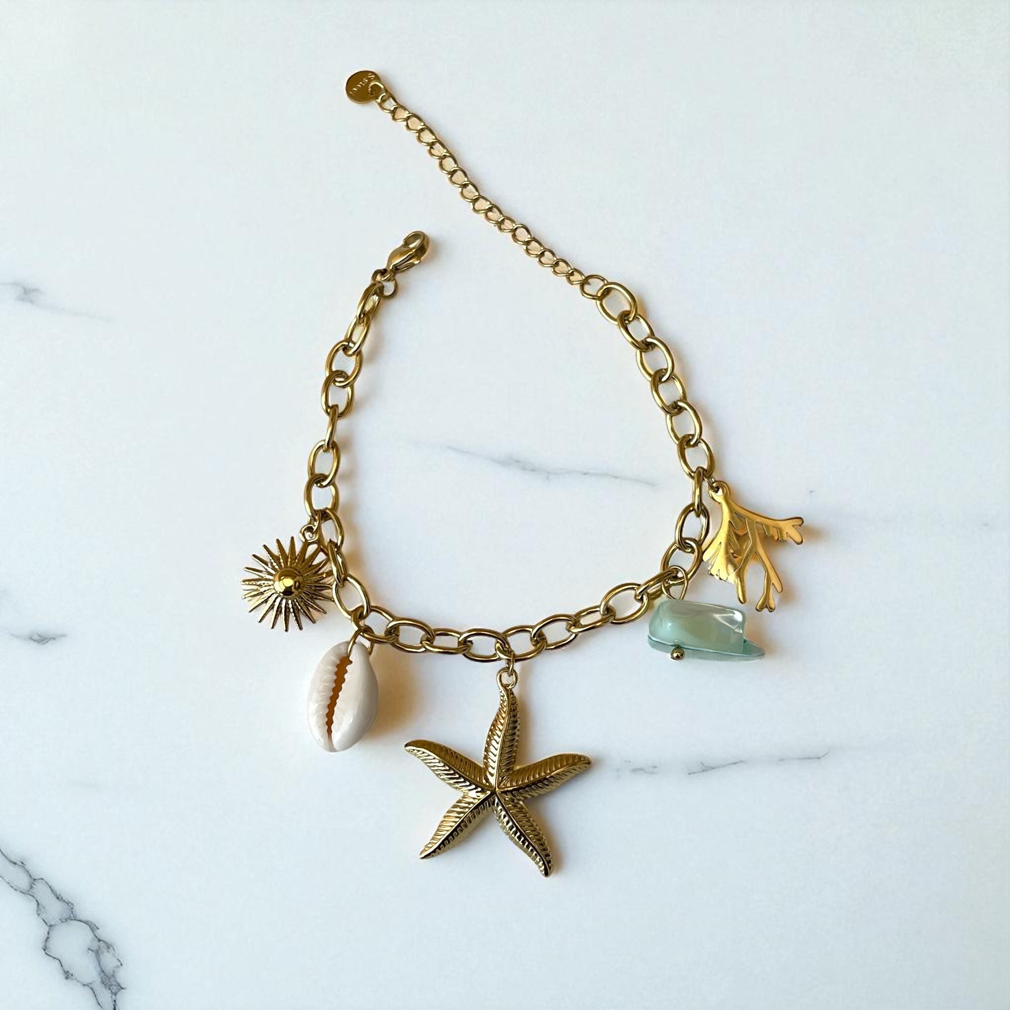 Bracelet doré charms étoile de mer coquillage perle Rklisa