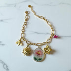 Bracelet chaîne dorée avec charms fleur dessinée Rklisa