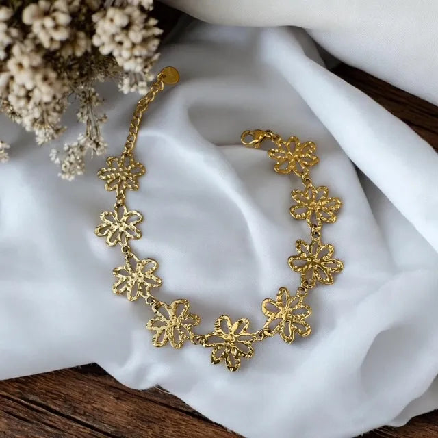 Bracelet Doré acier inoxydable doré fleurs ajourées